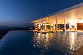 Villa illuminated at twilight